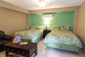 Image of 2 queen beds in ada room at Upper Deck Hotel In South Padre Island