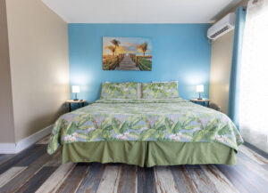 Image of King Bed In Deluxe King Room at Upper Deck Hotel In South Padre Isladn