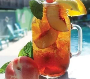 image of peach sangria in mason jar mug